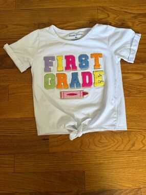 Sparkles in pink White "First Grade" Knot Front Tee